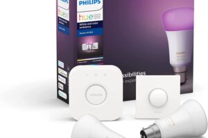 Produktbild von Philips Hue White and Colour Ambiance Starter Kit: Smart Bulb 2x Pack LED [B22 Bayonet Cap] Includes Hue Button + Bridge. Works with Alexa, Google Assistant and Apple HomeKit